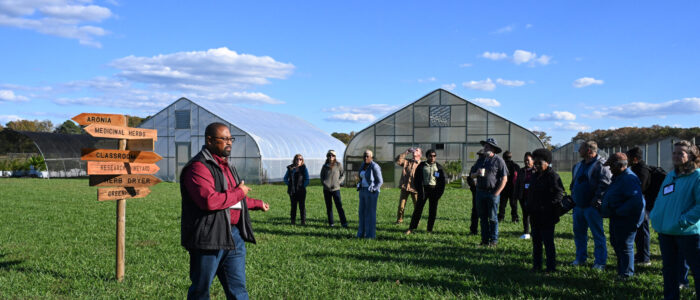 Small Farm Program Coordinator Berran Rogers leads a tour of the UMES farm.