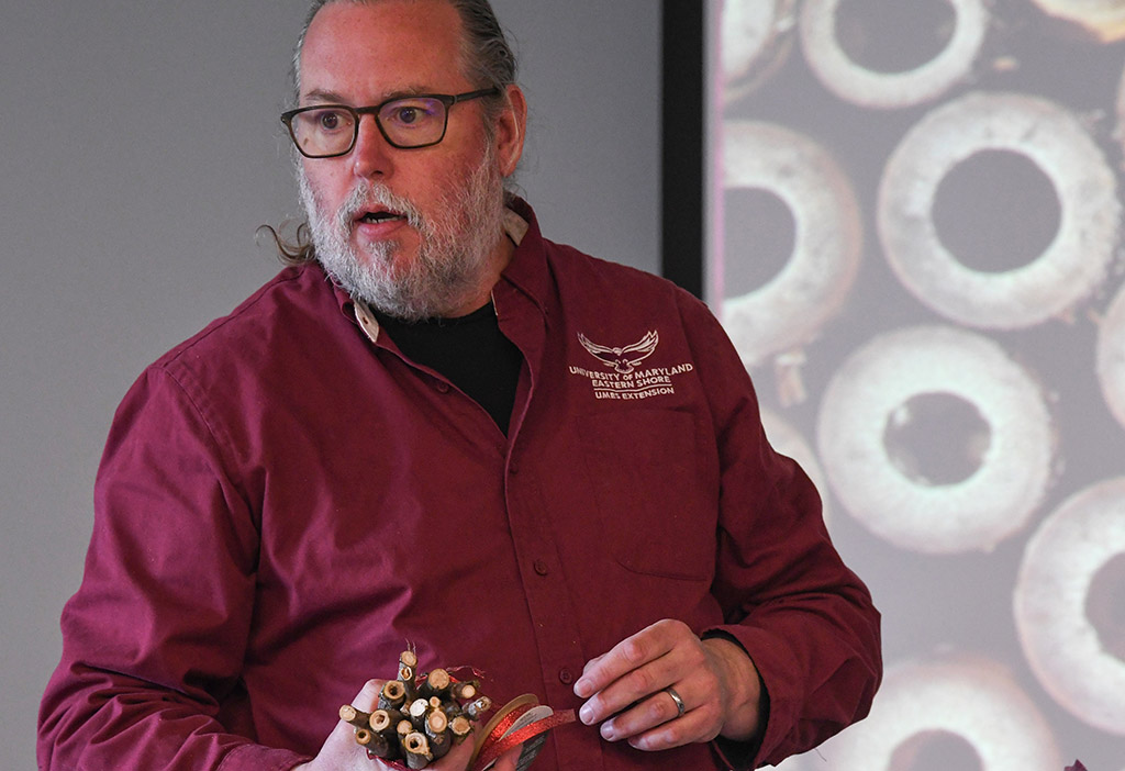 Beekeeper Stephen Goewey shows how to build a bee nest for native pollinator bees.