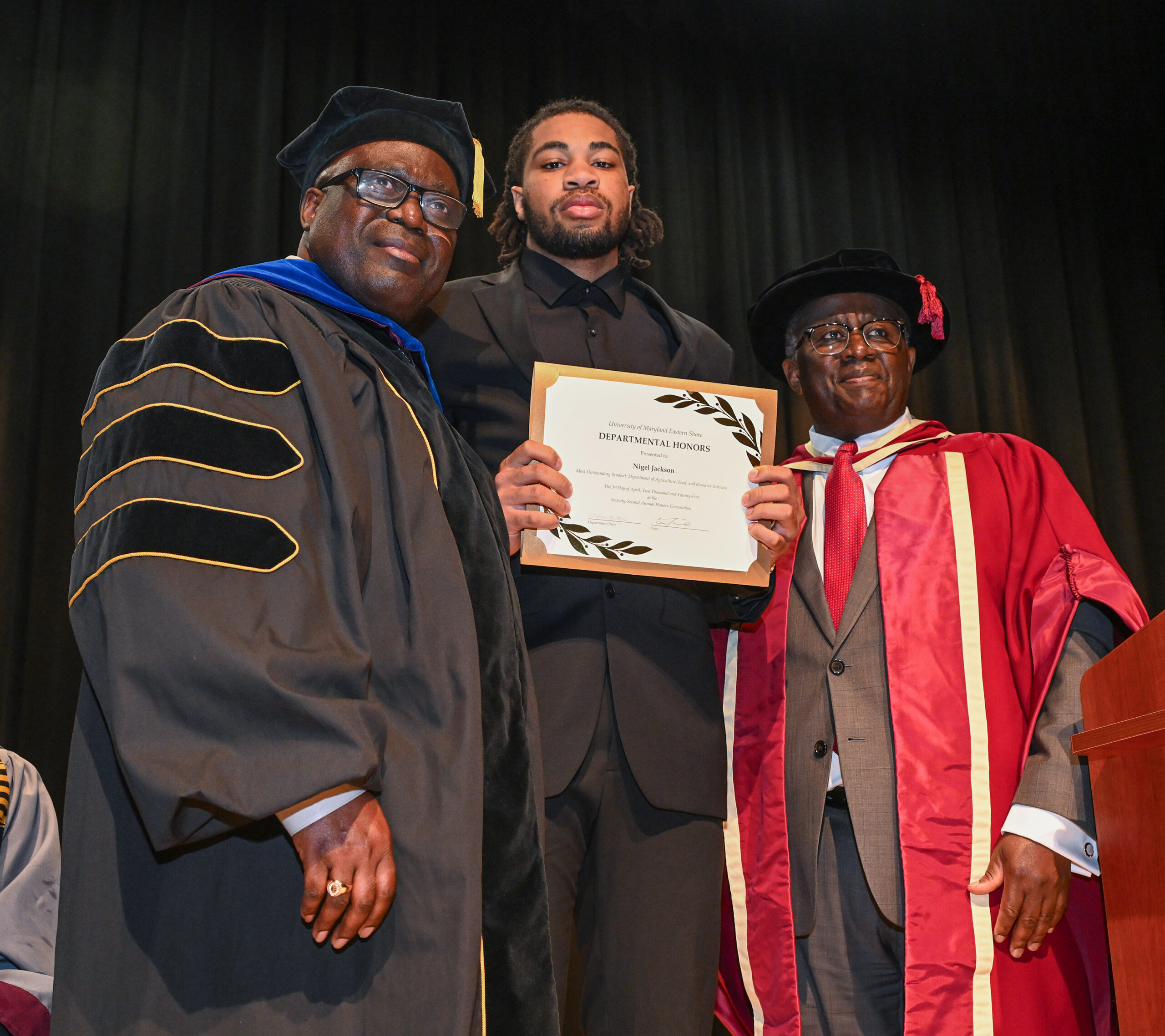 Nigel Jackson, Dept. of Agriculture, Food and Resource Sciences, honoree with Chair Dr. Stephan Tubene and Dean Dr. Moses T. Kairo.