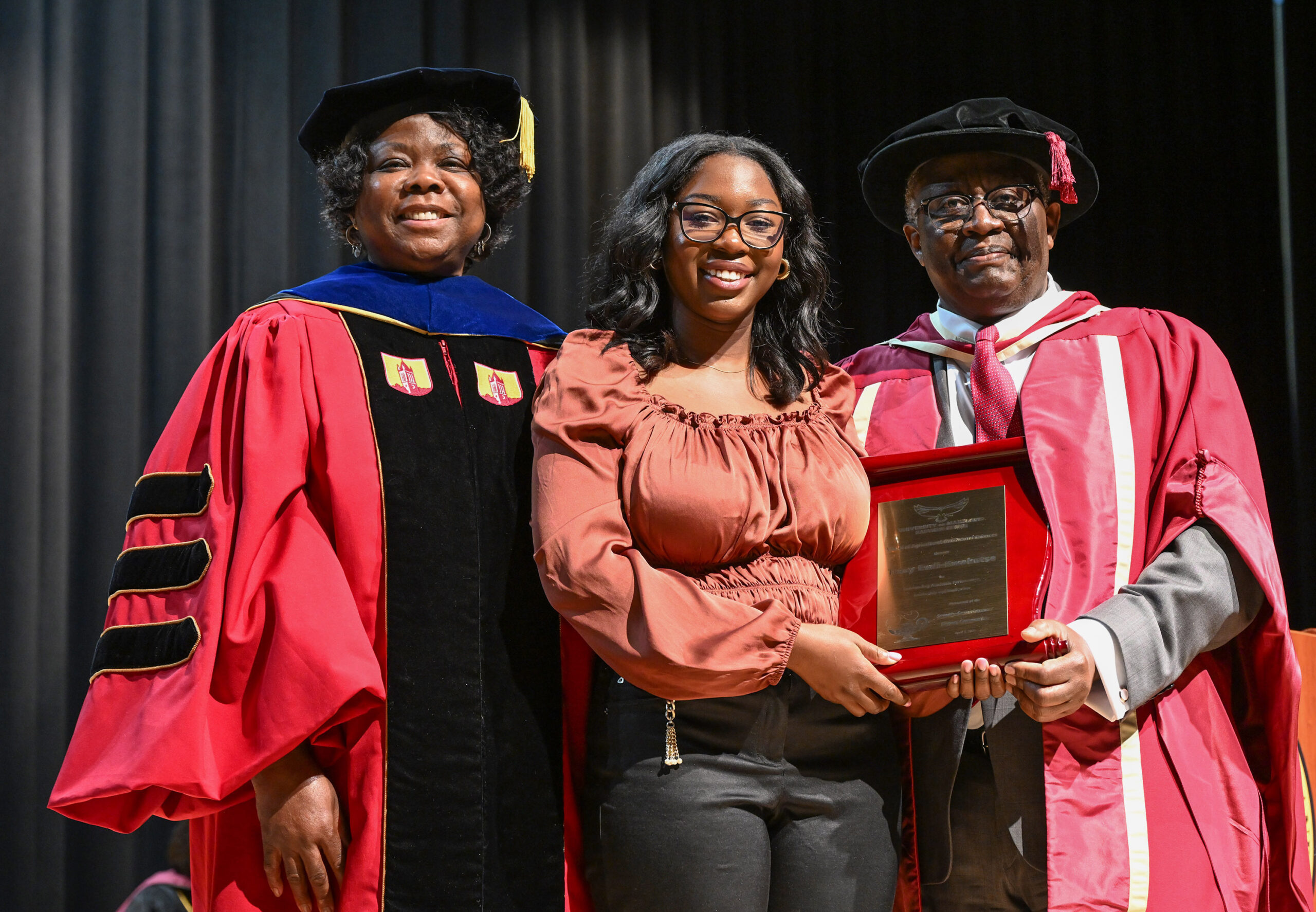Tracy Ewli-Kwakutse, Dept. of Human Ecology winner, with Department Chair Dr. Grace Namwamba and Dean Dr. Moses T. Kairo.
