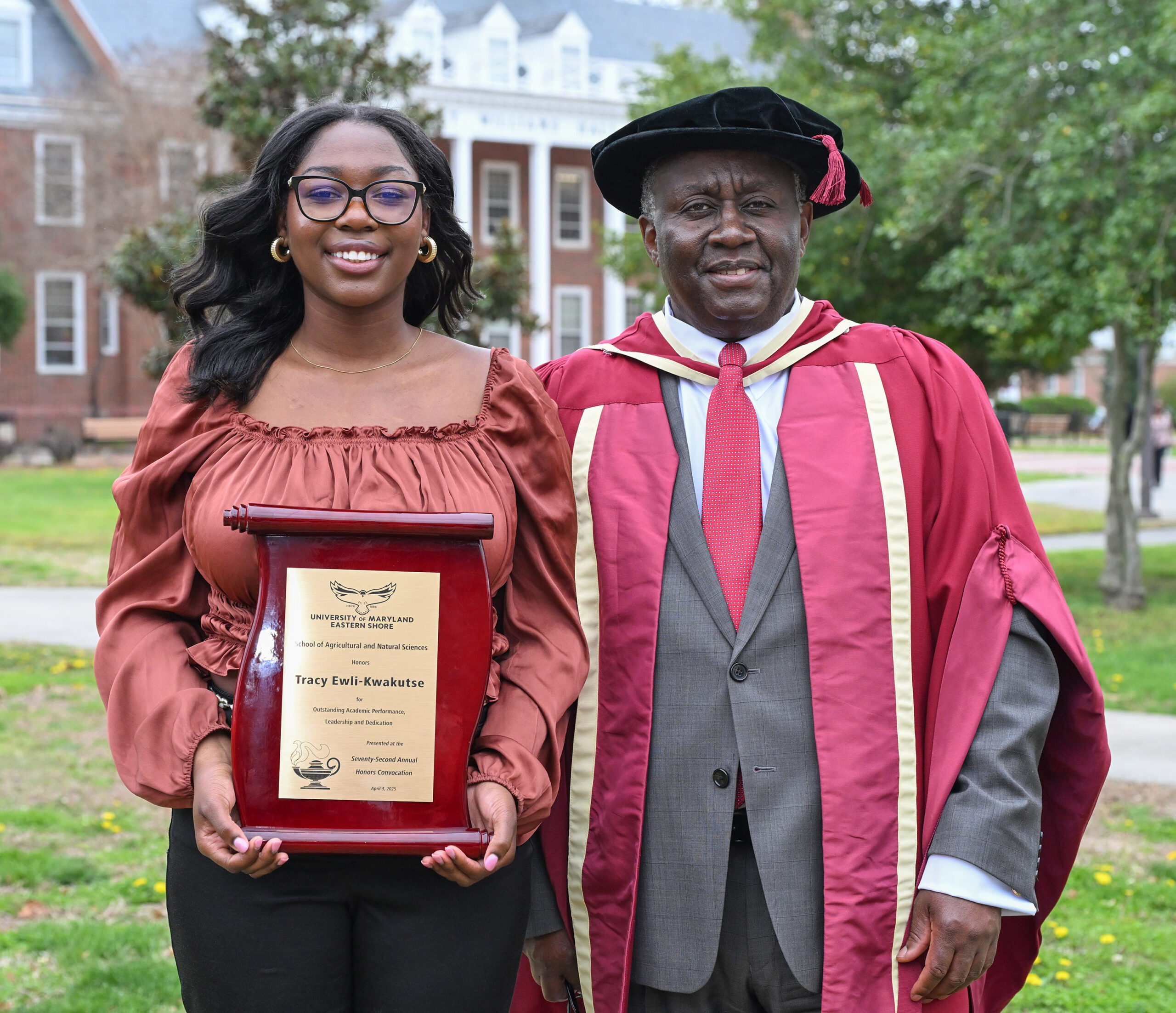 Tracy Ewli-Kwakutse, Dept. of Human Ecology, Award of Excellence for the School of Agricultural and Natural Sciences, with Dean Dr. Moses T. Kairo.