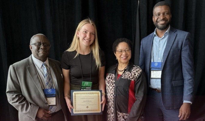 UMES graduate student Isabella Beasley holds a certificate for first place oral presentation at the 2026 ARD Symposium.