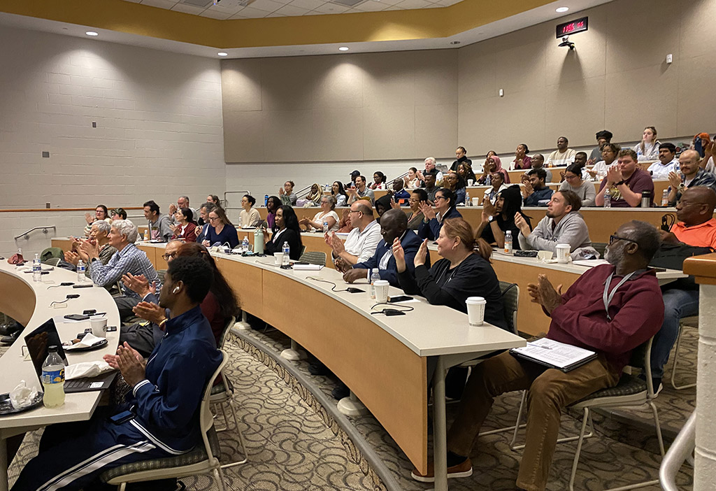 The audience applauds at the final SANS spring seminar of 2026.
