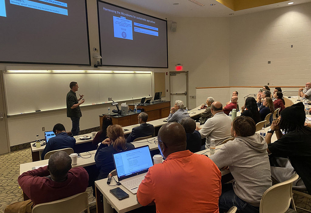 Dr. Francisco Dini-Andreote, an assistant professor at Penn State, speaks at the final SANS Spring Seminar.