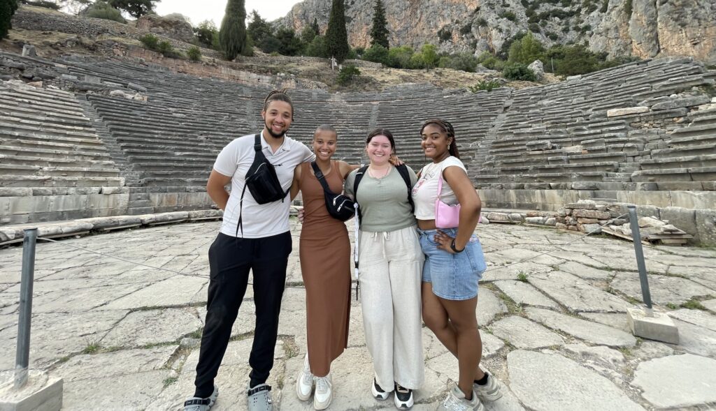 Four HBCU students pose for a photo in Greece.